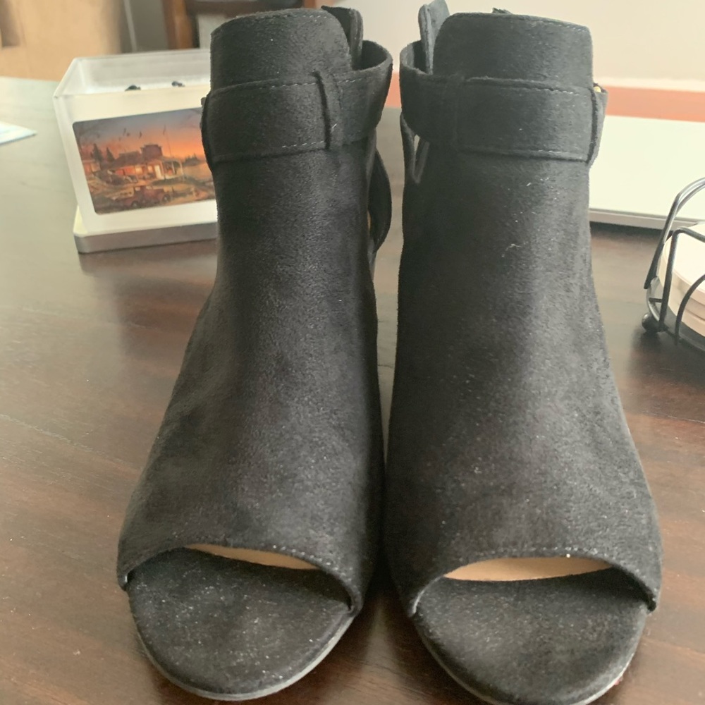 Super cute open toed booties with a heel
